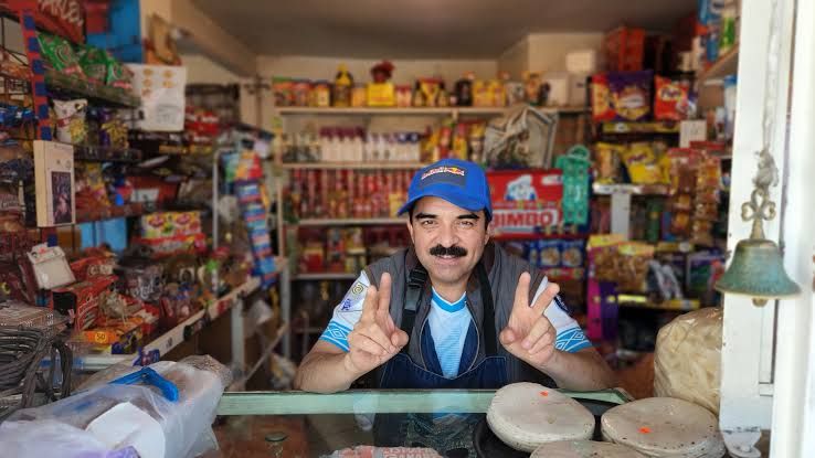A shopkeeper at his tiendita
