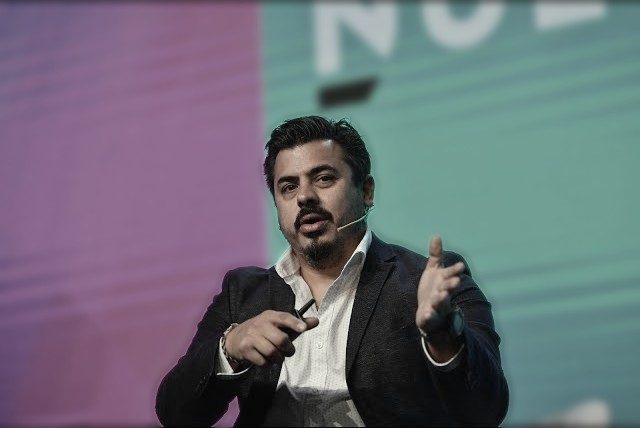 Diego Cibils speaking on stage